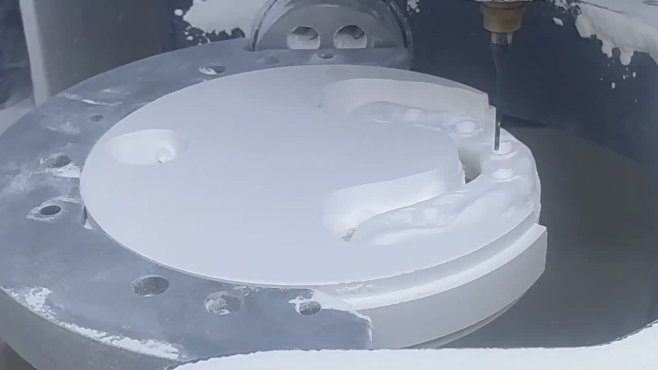 Zirconia disc being milled for crowns and bridges